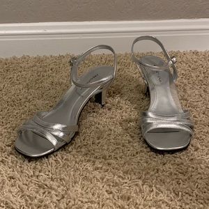 PREDICTIONS | Silver Open-toed strap heels.